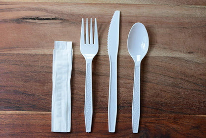 Heavy-Duty Disposable White Cutlery Kit – 4-in-1 Plastic Wrapped Set with Fork, Spoon, Knife & Napkin